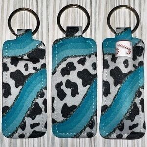 Cow print blue sparkle swirl chapstick holder new